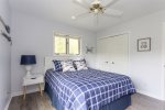 Queen bedroom upstairs with nightstand