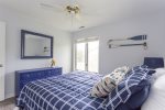 Charming coastal decor in this Queen bedroom