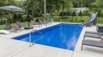 Beautifully furnished pool area with loungers 