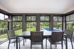 Beautiful screen porch overlooking the beautiful pool area