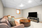 Basement living area with smart TV