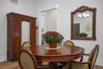 Game table in the entryway perfect for a poker game 