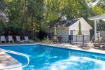 Spacious pool area with dining area off the back corner 