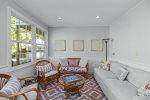 Sunroom at the back of the home opens onto a newly redone deck