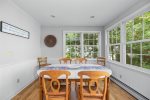 Extra dining table in the sunroom