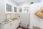 Unpack and kick off your shoes in this large mudroom entryway