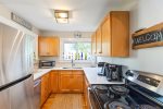 Cozy, fully equipped kitchen just off the dining space