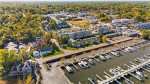 Home on the left with views of the Marina with boat slip