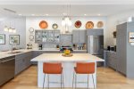 Bar seating in the spacious main house kitchen