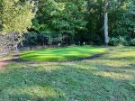 Bring your clubs and enjoy some putting practice on the putting green, perfect for golfers looking to refine their skills while enjoying the outdoors.