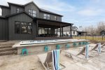 Chaise Lounges, Spa Pool and Rear View of Home.