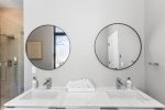 Beautiful high end bathroom with double sinks in primary suite 