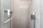 Custom tile shower in the Primary bathroom 