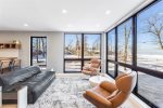 Charming seating area off the kitchen with lake view