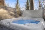 Enjoy a soak in the 8 person hot tub 