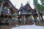 Tamarack Treehouse takes center stage and is neighbored by Cedar Treehouse and Ponderosa Treehouse at Snow Bear Chalets.