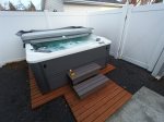 Jetted hot tub fully fenced for privacy