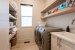 Laundry room on main level. Upstairs is an additional closet with a stacked washer and dryer