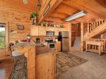 Kitchen with step leading to the loft area