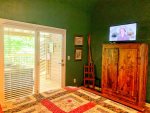 Master King bedroom with doors to get to the hot tub